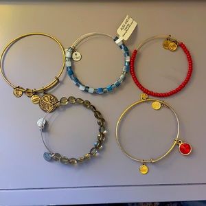 5 stackable Alex and Ani bracelets